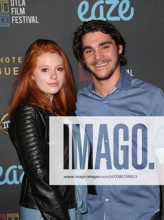 LOS ANGELES, CA - OCTOBER 21: RJ Mitte, Lacianne Carriere, at the Premiere of RIVER RUNS RED at the DTLA Film Festival at Regal Cinemas L.A. LIVE in Los Angeles, California on October 21, 2018.