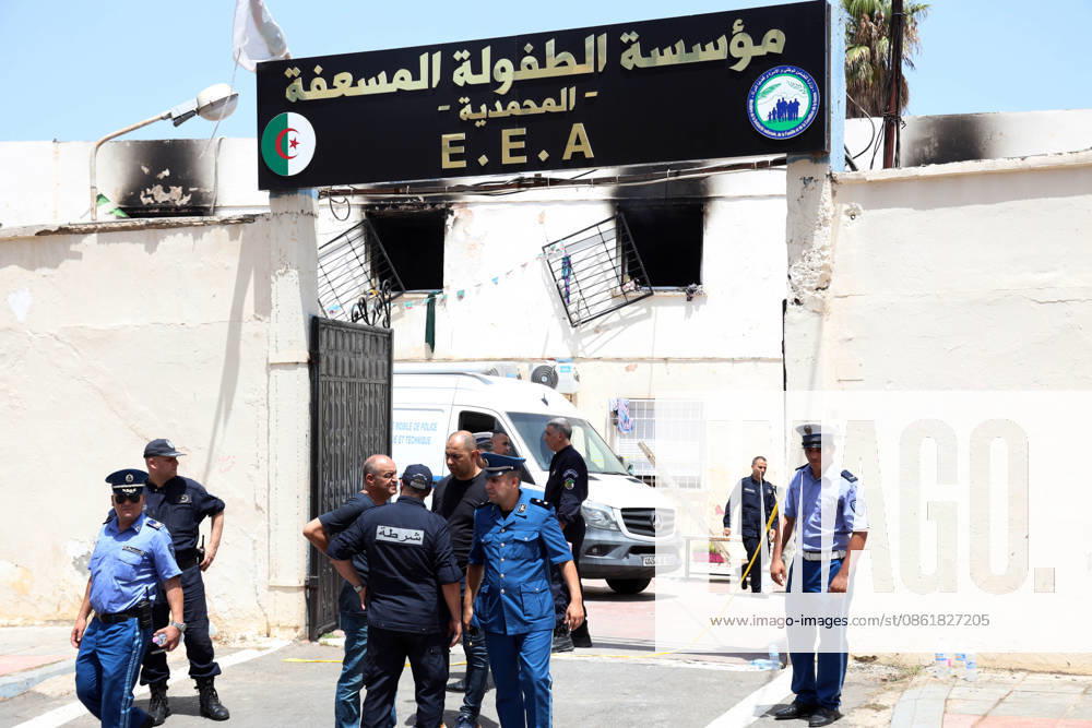 KW29 (260716) -- ALGIERS, July 16, 2026 -- Police officers stand guard after a fire ravaged an orphanage in Algiers, Algeria, on July 16, 2026. Eleven children were killed and 19 others injured in a fire that broke out Thursday morning at an orphanage in the Algerian capital Algiers, authorities said in a report. (Photo by Xinhua) (SpotNews) ALGERIA-ALGIERS-ORPHANAGE-FIRE BillelxBensalem