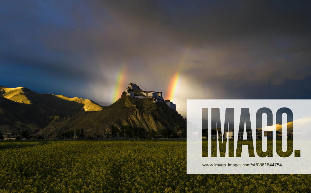 KW29 SHIGATSE CHINA - JULY 16: Double rainbow hangs in the sky above Jiangzi Zongshan Castle on July 16, 2026 in Jiangzi, Xizang Autonomous Region of China.