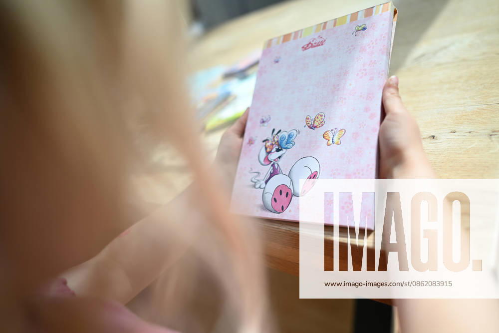 Diddl Makes a Comeback in Germany A young girl is holding a new Diddl notebook. After more than a decade, the iconic plush mouse is returning to the German market, prompting many people to look back nostalgically on their school days. Berlin, Berlin, Germany