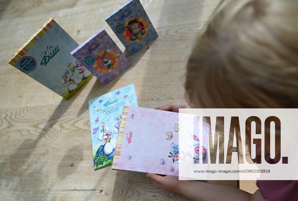 Diddl Makes a Comeback in Germany A young girl is holding a new Diddl notebook. After more than a decade, the iconic plush mouse is returning to the German market, prompting many people to look back nostalgically on their school days. Berlin, Berlin, Germany