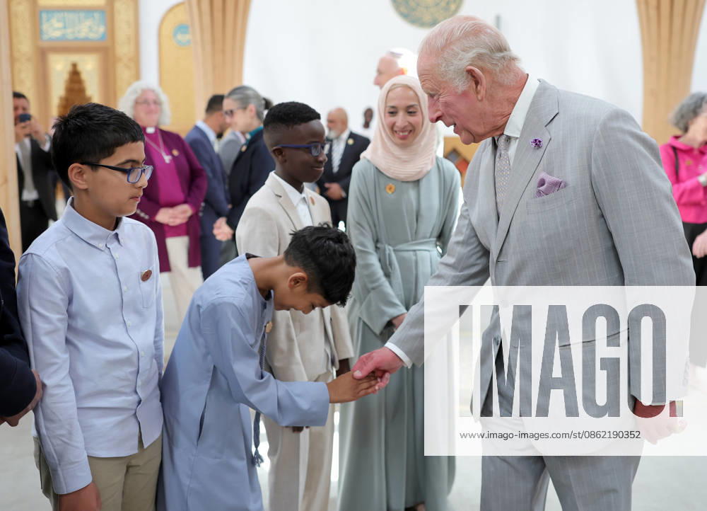 King Charles III Visits Cambridge CAMBRIDGE, ENGLAND - JULY 20: King Charles III shakes hands with a young person in the prayer hall during his visit to Cambridge Central Mosque on July 20, 2026 in Cambridge, England. Europes first Eco-Mosque, its notable for its architectural quality, environmental leadership and role as a place of worship and community engagement., Credit:Chris Jackson PA ROTA - B68 Avalon United Kingdom, England, Cambridge