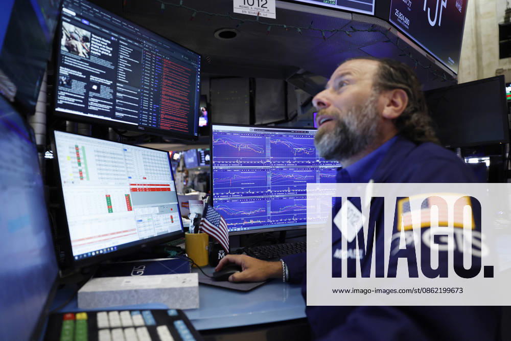 Traders work on the floor of the New York Stock Exchange on Wall Street on Monday, July 20, 2026 in New York City. The S&P 500 and Nasdaq Composite began the day higher on Monday and oil prices fluctuated in response to the latest bout of military exchanges between the U.S. and Iran. NYP20260720106 JOHNxANGELILLO