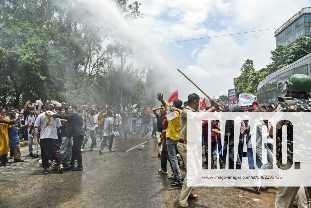 AISA supporters stage a Lok Bhawan March against the irregularities and examination paper leaks Patna, Jul 22 (ANI): Police personnel carry out a lathi charge on AISA supporters during the Lok Bhawan March against the irregularities and examination paper leaks, in Patna on Wednesday. Patna Bihar India