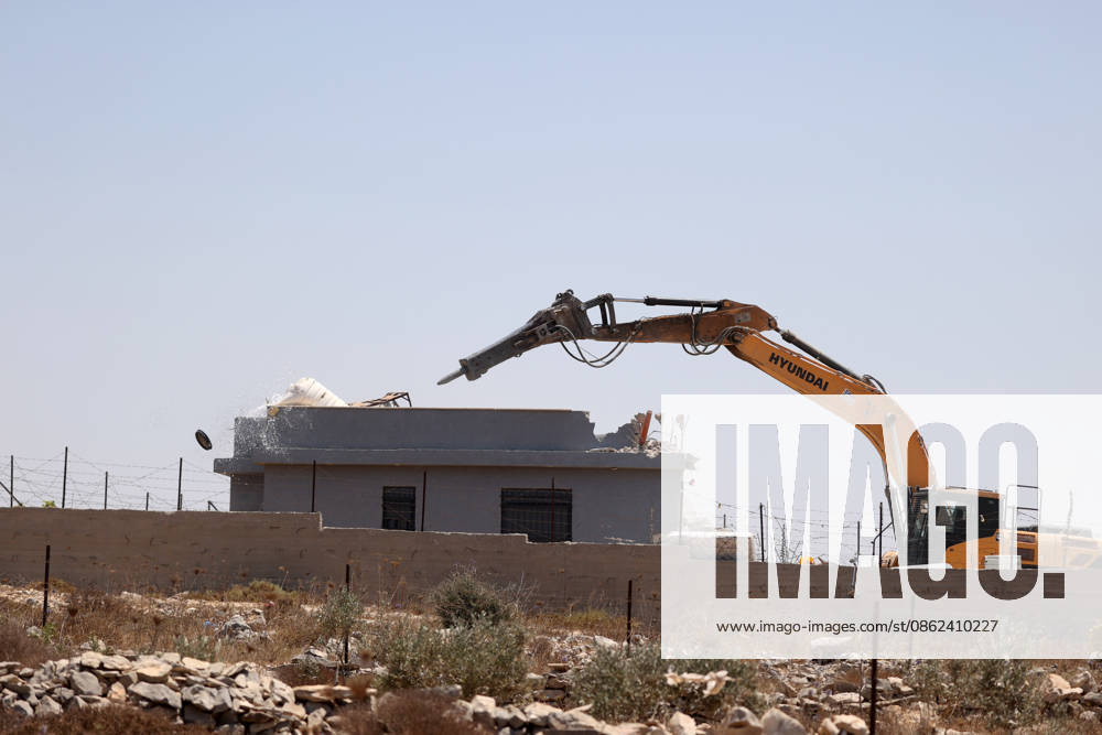 Israeli forces demolish structures in Jerusalem RAFAT, JERUSALEM - JULY 22: Israeli forces, accompanied by bulldozers, carry out a raid in the town of Rafat, northwest of East Jerusalem, on July 22, 2026. During the operation, Israeli authorities demolished a residential house, a car wash facility and two farms, claiming the structures had been built without the required permits. Issam Rimawi Anadolu Jerusalem Rafat. Editorial use only. Please get in touch for any other usage.
