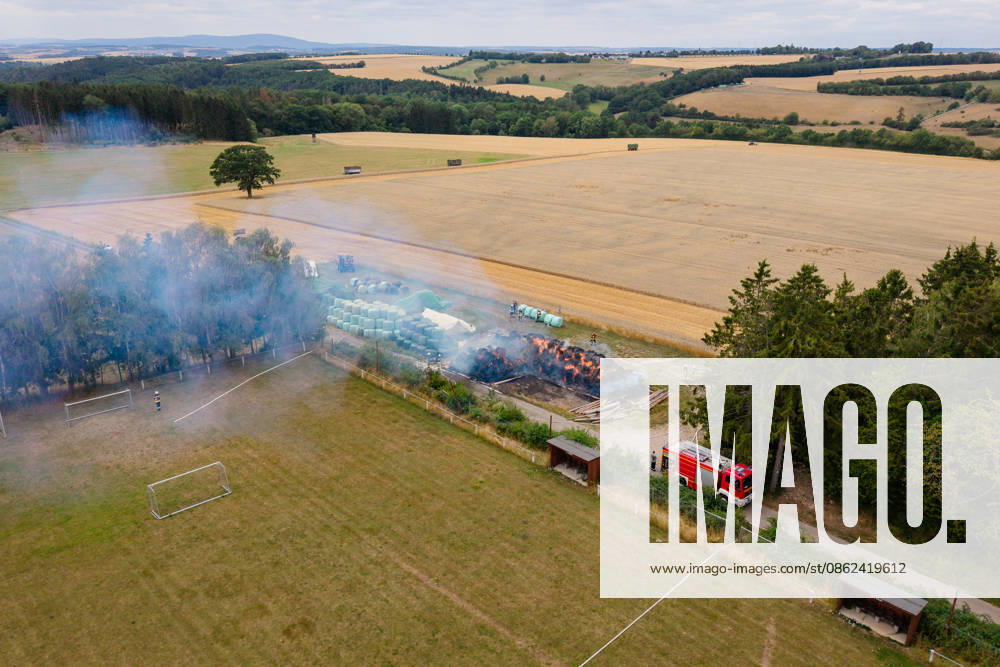 Police helicopter searches for arsonists; 200 round bales in flames; 70 emergency responders on the scene. On July 22, 2026, at