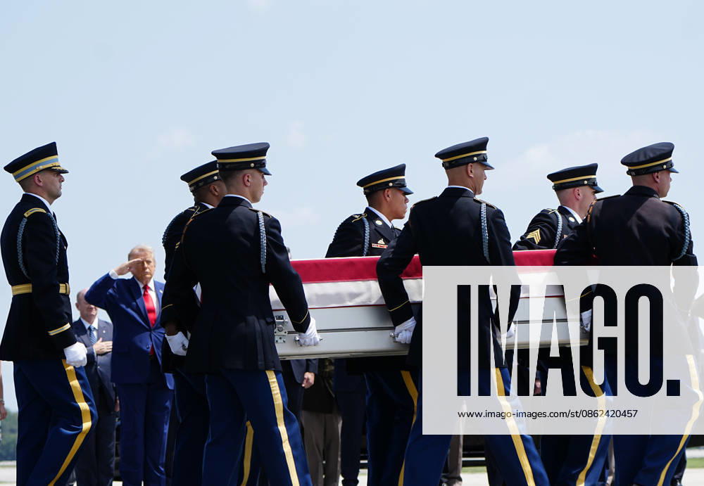 President Donald Trump watches as a U.S. Army carry team carries the transfer case containing the remains of Army 1st Lt. Tyler James Feehan during a dignified transfer at Dover Air Force Base in Dover, Delaware on Wednesday, July 22, 2026. Feehan was one of three soldiers killed as a result of Iranian strikes on Muwaffaq Salti Air Base in Jordan on July 17. DEL202607222002 BONNIExCASH