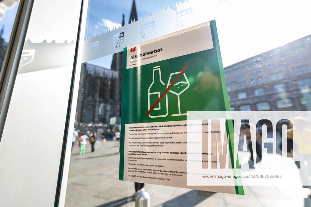 Alcohol Ban at Cologne Central Station: A Deutsche Bahn sign regarding the alcohol ban at Cologne Central Station, with Cologne Cathedral in the background. In response to increasing violence against rail staff and passengers, as well as a recent assault on a security officer, DB InfraGO is expanding the alcohol ban—which has been in effect i