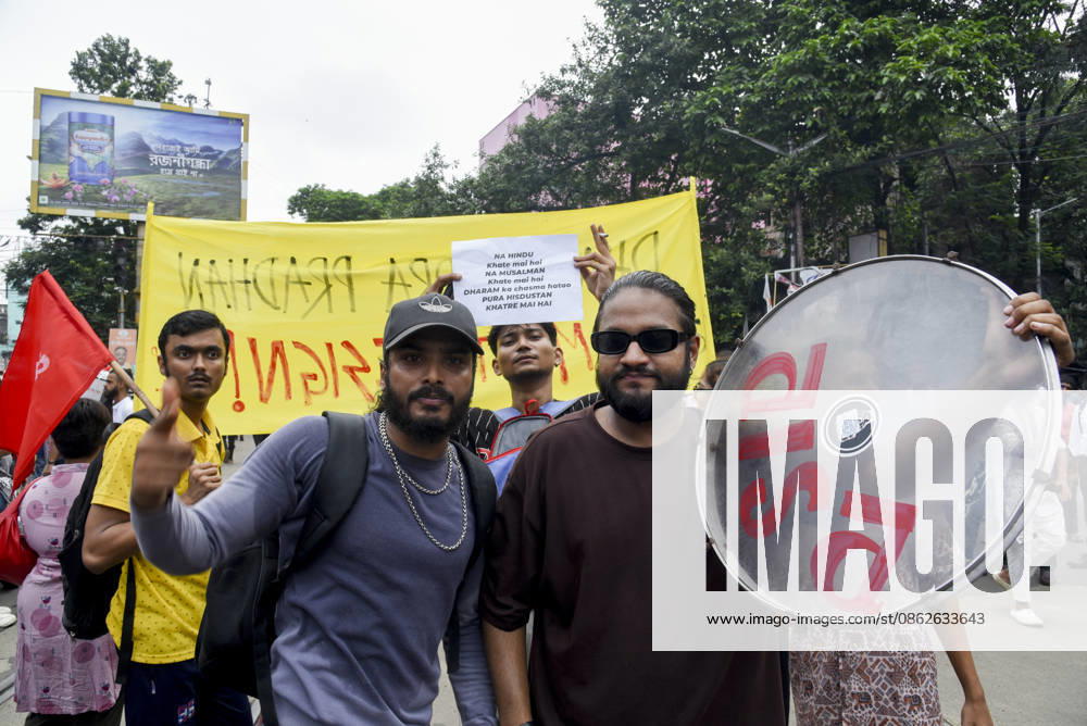 Kolkata Rally Supports CJP Protest Demonstrators pose with a drum in front of a yellow protest banner in Kolkata, India, on July 24, 2026. The rally was held in solidarity with the Cockroach Janta Party s ongoing protest at New Delhi s Jantar Mantar demanding the resignation of Education Minister Dharmendra Pradhan over alleged NEET examination irregularities, as leaders of the youth-led movement held a second round of talks with government officials after Prime Minister Narendra Modi pledged legal reforms and swift punishment for those involved in exam paper leaks. Kolkata West Bengal India