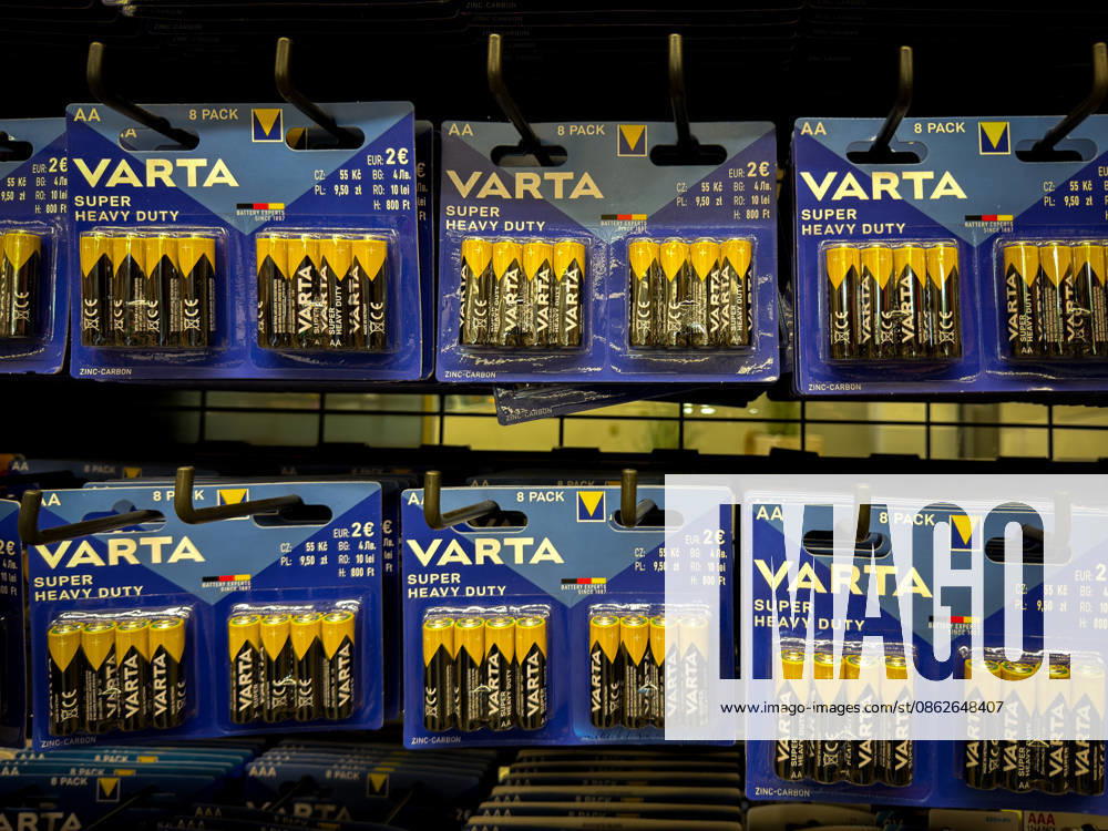 Retail shelf displaying VARTA batteries: AA and AAA batteries from the Super Heavy Duty product line in blister packs; brand-name product, batteries, power supply, retail, retail shelf, consumer goods, electronics accessories, economy, trade, consumers, brand-name products, VARTA, Germany, industry, ba