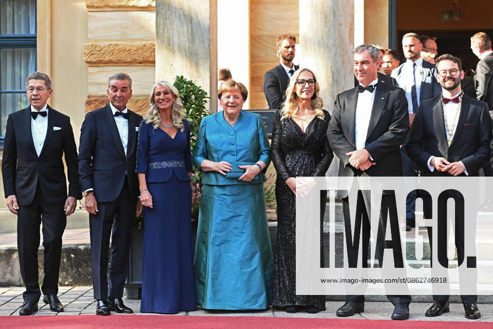 From left: Joachim SAUER, Michel FRIEDMANN, Karin BAUMUELLER SOEDER, Angela MERKEL, former German Chancellor, Katharina WAGNER, Markus SOEDER, Minister-President of Bavaria and CSU Chairman, Andreas ZIPPEL, Mayor of Bayreuth, Opening of the 2026 Bayreuth Richard Wagner Festival, Red carpet on July 25, 2026, at the Green Hill,