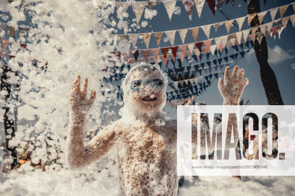 Children get covered in foam as they participate in a foam party looking for some refreshment during the traditional Sant AntoniFestival in Fornells Fornells Spain - ZUMAo105 20260727_fap_o105_006