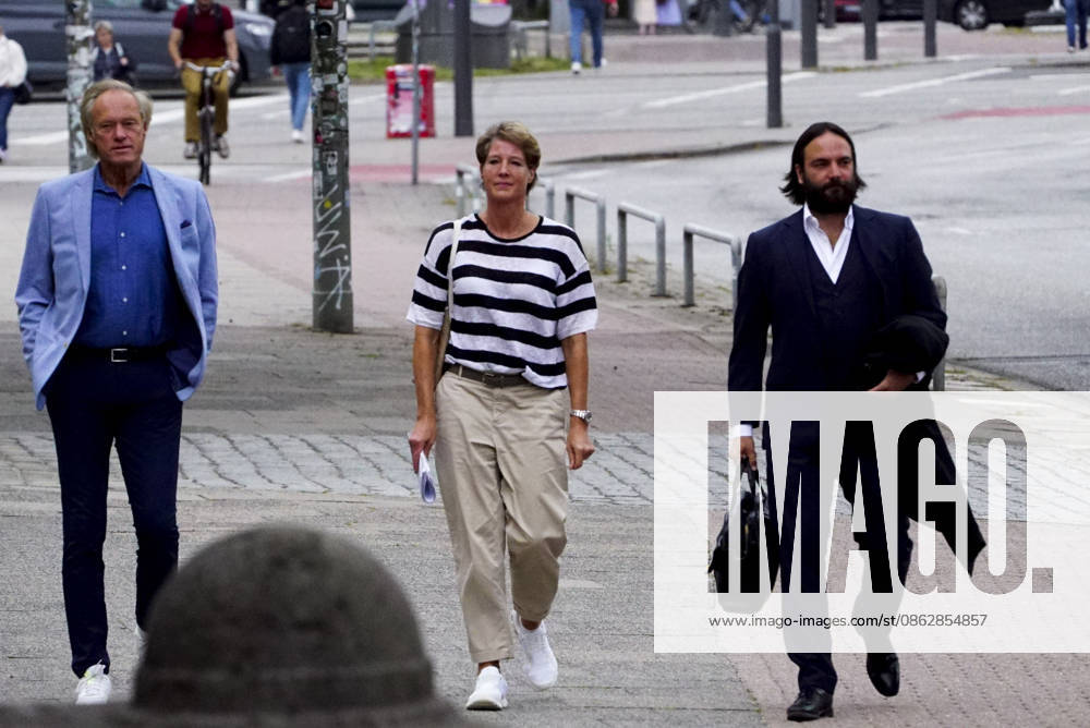 CNTV BLOCK Gerhard Delling, TV host; Christina Block, businesswoman, with her attorney Ingo Bott on their way to court on a street in Hamburg on July 28, 2026, for the trial regarding the alleged child abduction at the Hamburg Regional Court’s Criminal Justice Building—the Block children’s abduction case Hamburg, Germany
