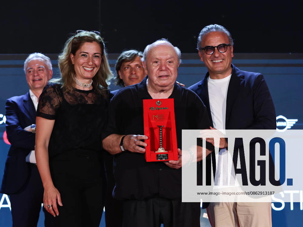 IPA87075698 - Soverato (CZ), 23rd edition of the Magna Graecia Film Festival—fourth night. Pictured: Monica and Giuseppe Spadafora and Lino Banfi with the Colonna d Oro