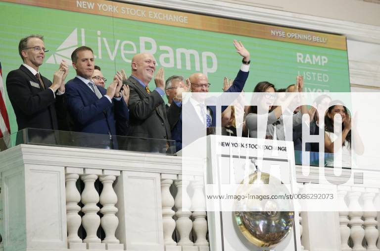LiveRamp representatives ring the the opening bell at the New York Stock Exchange on Wall Street in New York City on October 29, 2018. The Dow Jones Industrial Average opened over 200 points to start the day. NYP20181029105 JOHNxANGELILLO