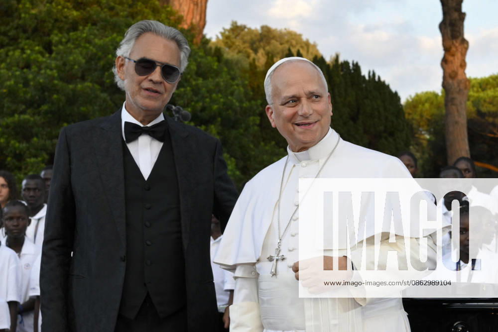 ITALY - POPE LEO XIV DURING A CONCERT IN BORGO LAUDATO SI , A 55-HECTARE EDUCATIONAL AND ENVIRONMENTAL CENTER, AT CASTEL GANDOLFO - 2026 7 29 Italy, Castel Gandolfo , Vatican, 2026 7 29 Pope Leo XIV smiles next to Italian tenor Andrea Bocelli after a concert in Borgo Laudato Si, a 55-hectare educational and environmental center, at Castel Gandolfo - NO BOOKS