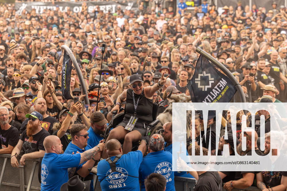 The 35th Wacken Open Air: Friday, Headliner Day, and Friday is Flyday, when people with disabilities—including those in wheelchairs—crowd-surfed. With temperatures that were almost mild, Friday at the Wacken Open Air once again broke all records. All day long, fans waited not only for Judas