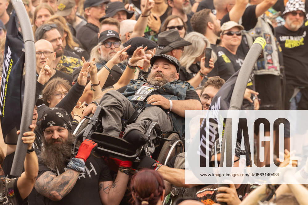 The 35th Wacken Open Air: Friday, Headliner Day, and Friday is Flyday, when people with disabilities—including those in wheelchairs—crowd-surfed. With temperatures that were almost mild, Friday at the Wacken Open Air once again broke all records. All day long, fans waited not only for Judas