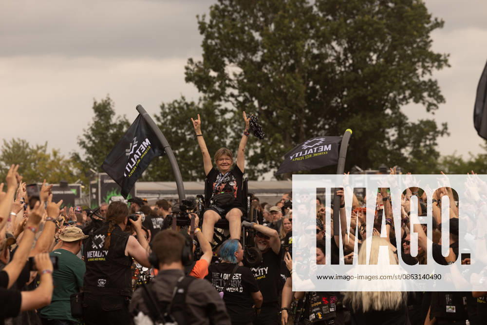 The 35th Wacken Open Air: Friday, Headliner Day, and Friday is Flyday, when people with disabilities—including those in wheelchairs—crowd-surfed. With temperatures that were almost mild, Friday at the Wacken Open Air once again broke all records. All day long, fans waited not only for Judas