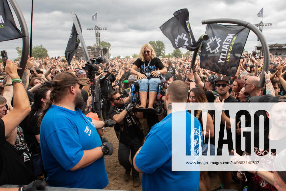 The 35th Wacken Open Air: Friday, Headliner Day, and Friday is Flyday, when people with disabilities—including those in wheelchairs—crowd-surfed. With temperatures that were almost mild, Friday at the Wacken Open Air once again broke all records. All day long, fans waited not only for Judas