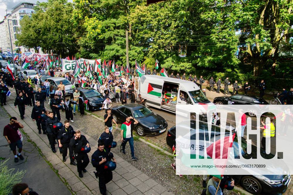 BERLIN, Germany †August 2026: Thousands of people march through the Prenzlauer Berg district of Berlin in solidarity with Palestine and against the ongoing war in Gaza. The demonstration, attended by families, children, and elderly participants, took place under heavy police presence. A counter-demonstration was also held by pro-Zionist groups, with police monitoring both gatherings. Berlin Germany - ZUMAq101 20260801_zna_q101_247