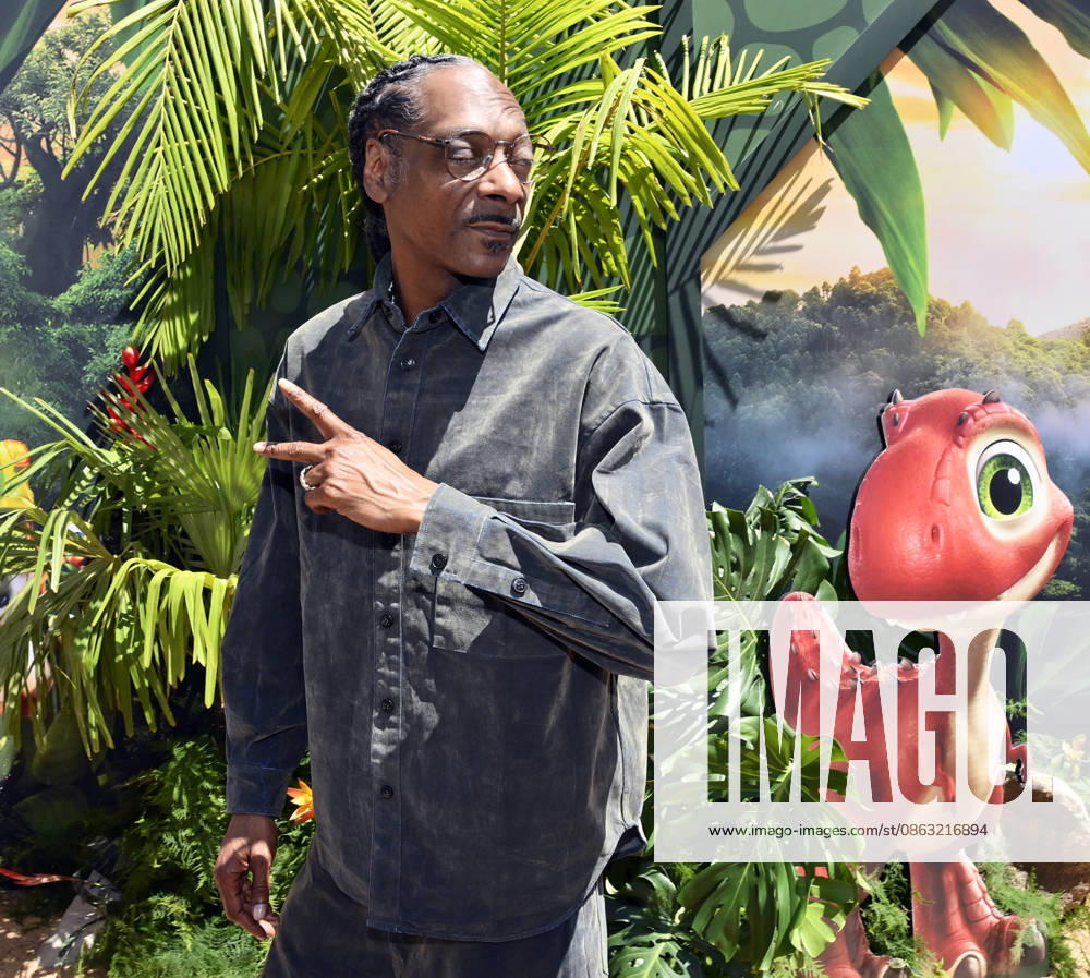 Cast member Snoop Dogg attends the global premiere of the computer animated animal adventure Paw Patrol: The Dino Movie at the Paramount Picture Studio lot in Los Angeles on Sunday, August 2, 2026. Storyline: The Paw Patrol lands on a mysterious dinosaur island after a storm, where they meet Rex, a stranded pup. When Humdinger s reckless mining triggers a volcano, the team faces their biggest rescue mission yet to save the island. LAP2026080224 JIMxRUYMEN