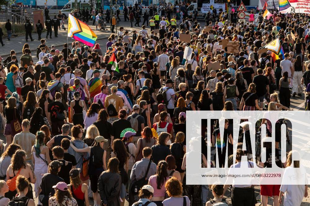 BERLIN, Germany †August 2, 2026: Thousands of people gather at Neptunebrunnen under the slogan â€oeFrom Grief to Anger to Resistance†to condemn the recent attack at Berlin Pride. The peaceful march continued to the Brandenburg Gate with participants carrying banners, posters, and drums. Police arrested one suspect near the demonstration who was carrying a German flag and fireworks. Berlin Germany - ZUMAq101 20260802_zna_q101_178