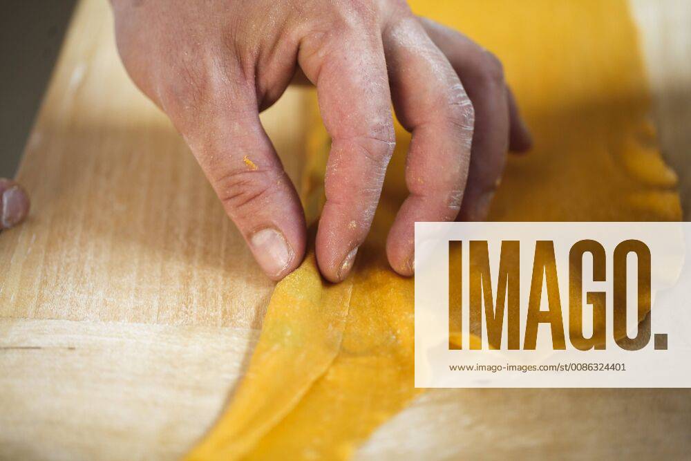 Close-up Of Man Shaping Homemade Fresh Pasta, Bologna, Italy, Bologna Emila Romagna Italy