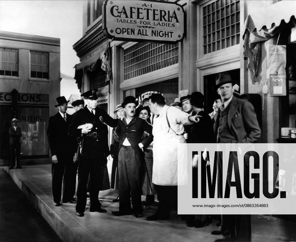Modern Times, 1936 Charlie Chaplin Modern Times 05 February 1936 Les temps modernes Moderne Zeiten Character(s): Director: Charles Chaplin SSV86810 Allstar Picture Library Ltd CHARLES CHAPLIN PRODUCTIONS **Warning** This Photograph is for editorial use only and is the copyright of CHARLES CHAPLIN PRODUCTIONS and or the Photographer assigned by the Film or Production Company & can only be reproduced by publications in conjunction with the promotion of the above Film. A Mandatory Credit To CHARLES CHAPLIN PRODUCTIONS is required. The Photographer should also be credited when known. No commercial use can be granted without written authority from the Film Company.