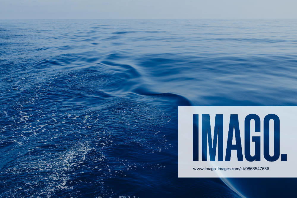 Deep blue sea water creates a wake behind a sailing boat in Ibiza, GMLF02162