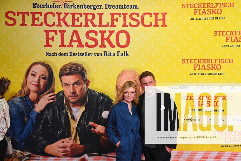 Sebastian BEZZEL, actor, with his wife Johanna Christine GEHLEN, actress, at the world premiere of *STECKERLFISCHFIASKO* on August 10, 20226, at the Mathaeser Kino in Munich. Red Carpet