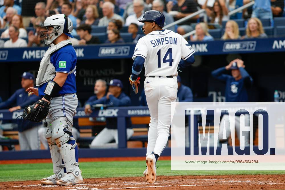 Tampa Bay Rays left fielder Chandler Simpson (14) scores at home plate against the Toronto Blue Jays during the fourth inning at Tropicana Field on Thursday, Aug. 20, 2026, in St. Petersburg. St. Petersburg USA - ZUMAs70_ 20260820_zan_s70_020