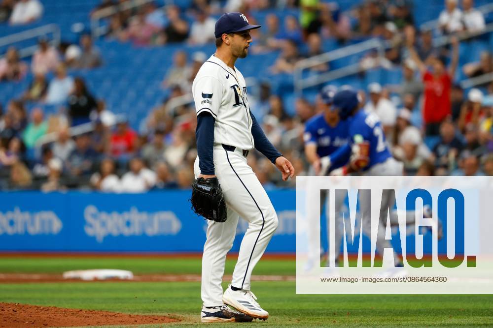 Tampa Bay Rays pitcher Ian Seymour (61) reacts, while Toronto Blue Jays outfielder Daz Cameron (23) rounds the bases when he homers during the fifth inning at Tropicana Field on Thursday, Aug. 20, 2026, in St. Petersburg. St. Petersburg USA - ZUMAs70_ 20260820_zan_s70_026