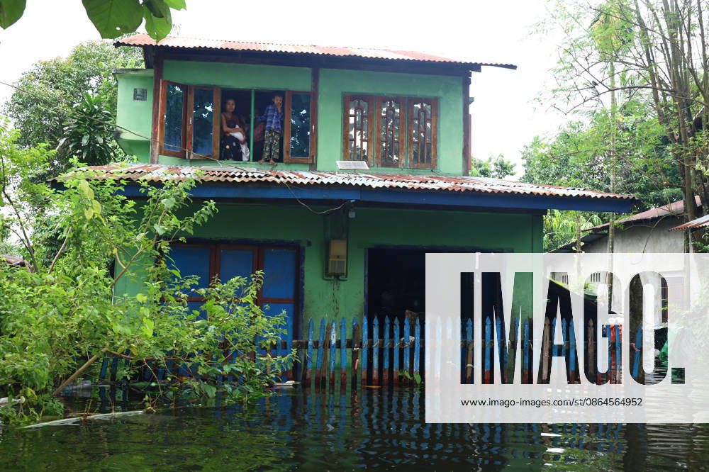 A resident remains inside a flooded house in Ngathaingchaung Township, Ayeyarwady Region, Myanmar..In Laymyethna Township, Ayeyarwady Region, the Ngawun River embankment collapsed on July 31, leaving nearby towns including Hinthada, Yegyi, Ngathaingchaung, Kyonpyaw and Kyaunggon still inundated for three weeks, affecting tens of thousands of people, officials said. Ngathaingchaung Myanmar - ZUMAn324 20260820_zip_n324_002