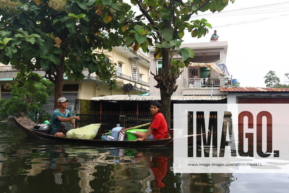 People navigates floodwaters by boat in Ngathaingchaung Township, Ayeyarwady Region, Myanmar..In Laymyethna Township, Ayeyarwady Region, the Ngawun River embankment collapsed on July 31, leaving nearby towns including Hinthada, Yegyi, Ngathaingchaung, Kyonpyaw and Kyaunggon still inundated for three weeks, affecting tens of thousands of people, officials said. Ngathaingchaung Myanmar - ZUMAn324 20260820_zip_n324_005