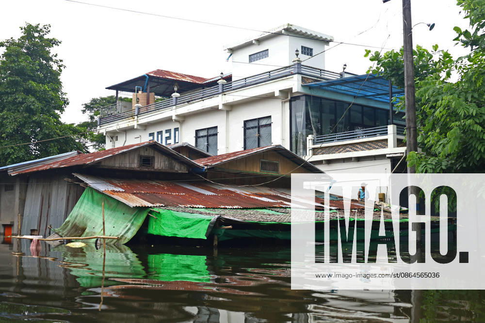 A resident remains inside a flooded house in Ngathaingchaung Township, Ayeyarwady Region, Myanmar..In Laymyethna Township, Ayeyarwady Region, the Ngawun River embankment collapsed on July 31, leaving nearby towns including Hinthada, Yegyi, Ngathaingchaung, Kyonpyaw and Kyaunggon still inundated for three weeks, affecting tens of thousands of people, officials said. Ngathaingchaung Myanmar - ZUMAn324 20260820_zip_n324_010