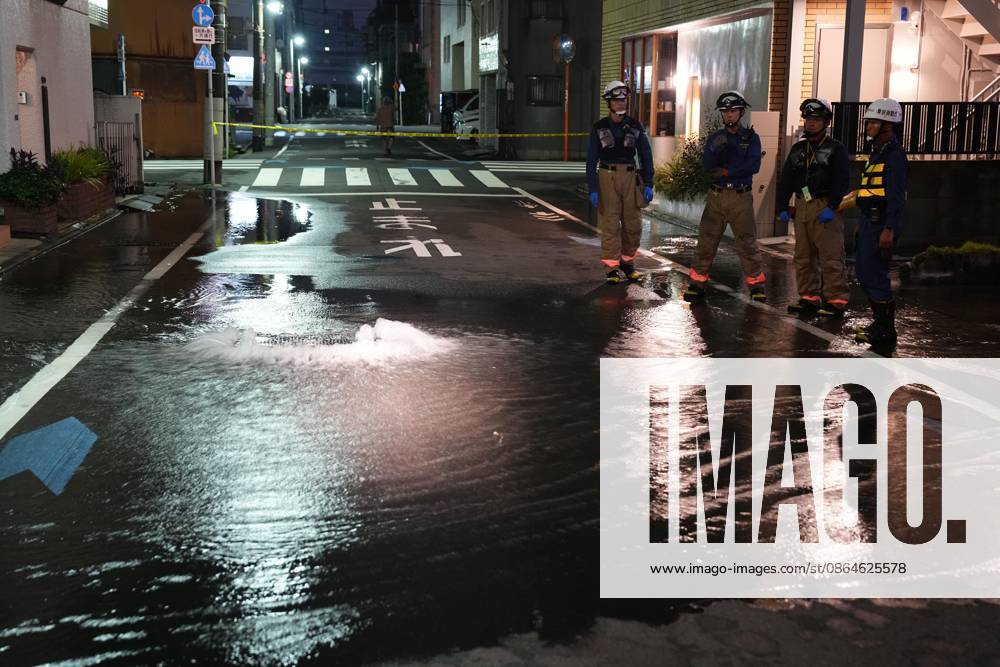Strong earthquake hits Tokyo area A street is partially flooded in Tokyo in the early hours of Aug. 23, 2026, following the rupture of a water pipe triggered by a strong earthquake that struck eastern Japan. A14AA0005626415P