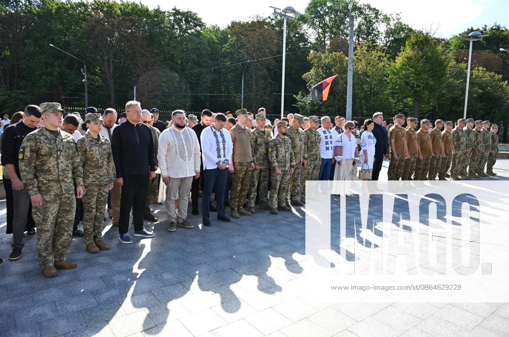 National Flag Day of Ukraine in Lviv LVIV, UKRAINE - AUGUST 23: Ukrainian servicemen and civilians observe a minute of silence during a National Flag Day ceremony in Lviv, Ukraine, on August 23, 2026. Due to the ongoing Russian-Ukrainian War, celebrations were limited to a ceremonial raising of the Ukrainian flag on the city s highest flagpole with the participation of soldiers from various branches of the armed forces. Participants also sang the Ukrainian national anthem, while a military orchestra performed patriotic and folk songs. Michael Sorrow Anadolu Lviv Ukraine. Editorial use only. Please get in touch for any other usage.