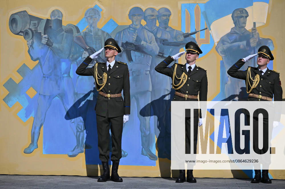 National Flag Day of Ukraine in Lviv LVIV, UKRAINE - AUGUST 23: Ukrainian servicemen salute during a National Flag Day ceremony in Lviv, Ukraine, on August 23, 2026. Due to the ongoing Russian-Ukrainian War, celebrations were limited to a ceremonial raising of the Ukrainian flag on the city s highest flagpole with the participation of soldiers from various branches of the armed forces. Participants also observed a minute of silence for those killed, sang the Ukrainian national anthem, and listened to patriotic and folk songs performed by a military orchestra. Michael Sorrow Anadolu Lviv Ukraine. Editorial use only. Please get in touch for any other usage.