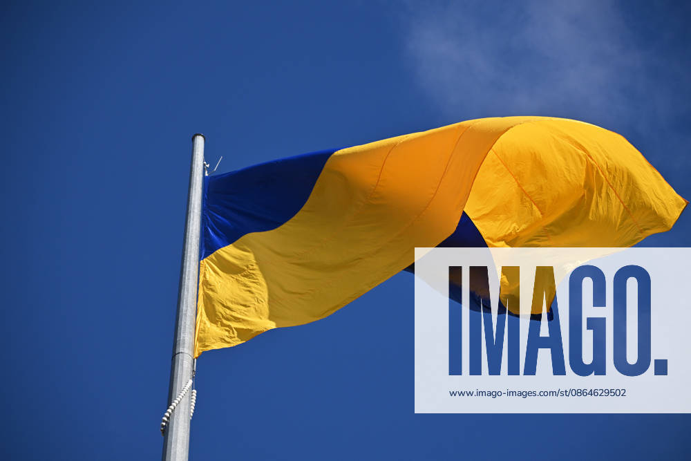 National Flag Day of Ukraine in Lviv LVIV, UKRAINE - AUGUST 23: Celebration of the National Flag Day of Ukraine during the Russian-Ukrainian War in Lviv, Ukraine on August 23, 2026. Due to the war, only the ceremonial raising of the Ukrainian flag on the highest flagpole in the city with the participation of soldiers from various branches of the armed forces took place. People also honored the fallen with a minute of silence, sang the Ukrainian anthem, and a military orchestra played several patriotic and folk songs. Michael Sorrow Anadolu Lviv Ukraine. Editorial use only. Please get in touch for any other usage.