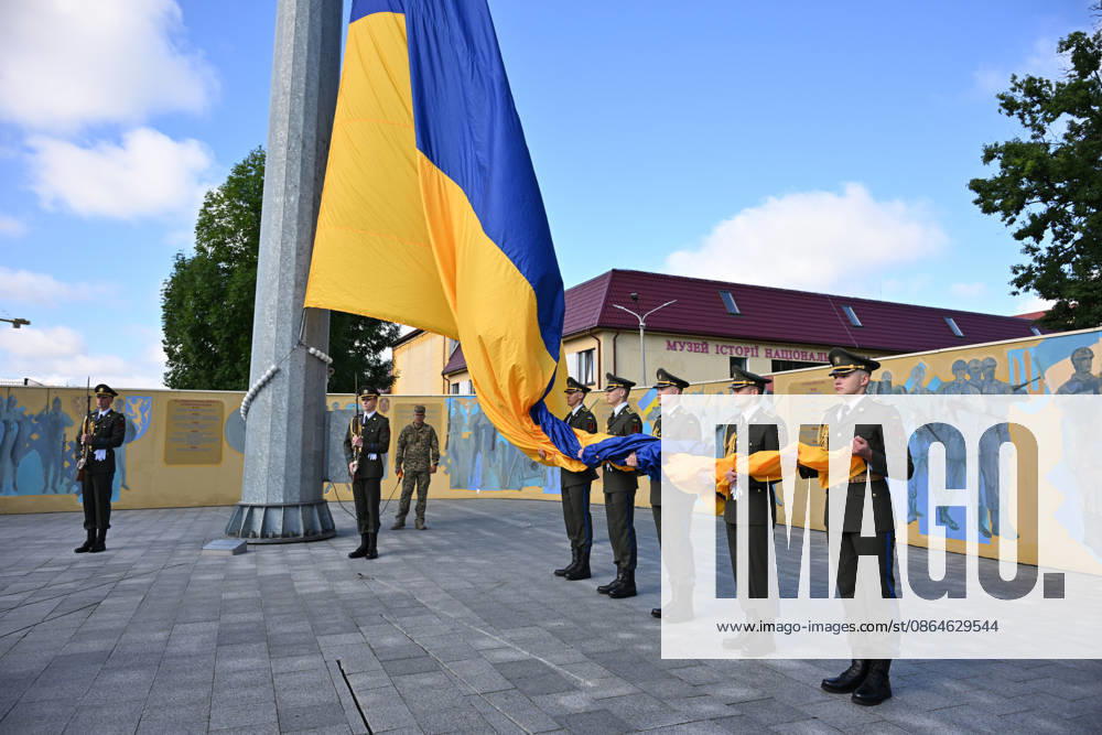 National Flag Day of Ukraine in Lviv LVIV, UKRAINE - AUGUST 23: Celebration of the National Flag Day of Ukraine during the Russian-Ukrainian War in Lviv, Ukraine on August 23, 2026. Due to the war, only the ceremonial raising of the Ukrainian flag on the highest flagpole in the city with the participation of soldiers from various branches of the armed forces took place. People also honored the fallen with a minute of silence, sang the Ukrainian anthem, and a military orchestra played several patriotic and folk songs. Michael Sorrow Anadolu Lviv Ukraine. Editorial use only. Please get in touch for any other usage.