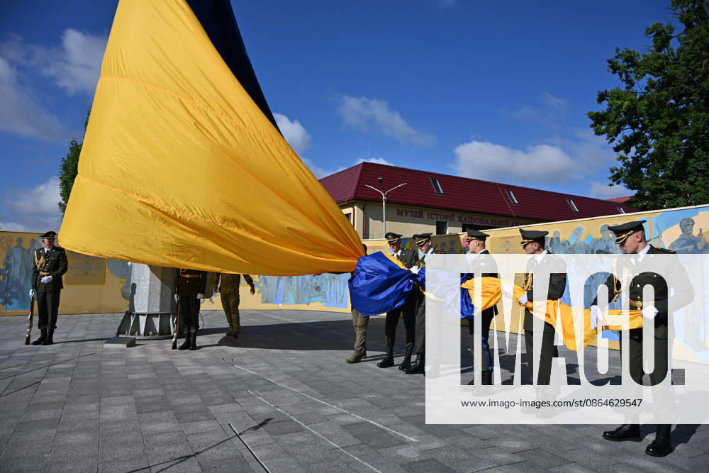 National Flag Day of Ukraine in Lviv LVIV, UKRAINE - AUGUST 23: Celebration of the National Flag Day of Ukraine during the Russian-Ukrainian War in Lviv, Ukraine on August 23, 2026. Due to the war, only the ceremonial raising of the Ukrainian flag on the highest flagpole in the city with the participation of soldiers from various branches of the armed forces took place. People also honored the fallen with a minute of silence, sang the Ukrainian anthem, and a military orchestra played several patriotic and folk songs. Michael Sorrow Anadolu Lviv Ukraine. Editorial use only. Please get in touch for any other usage.
