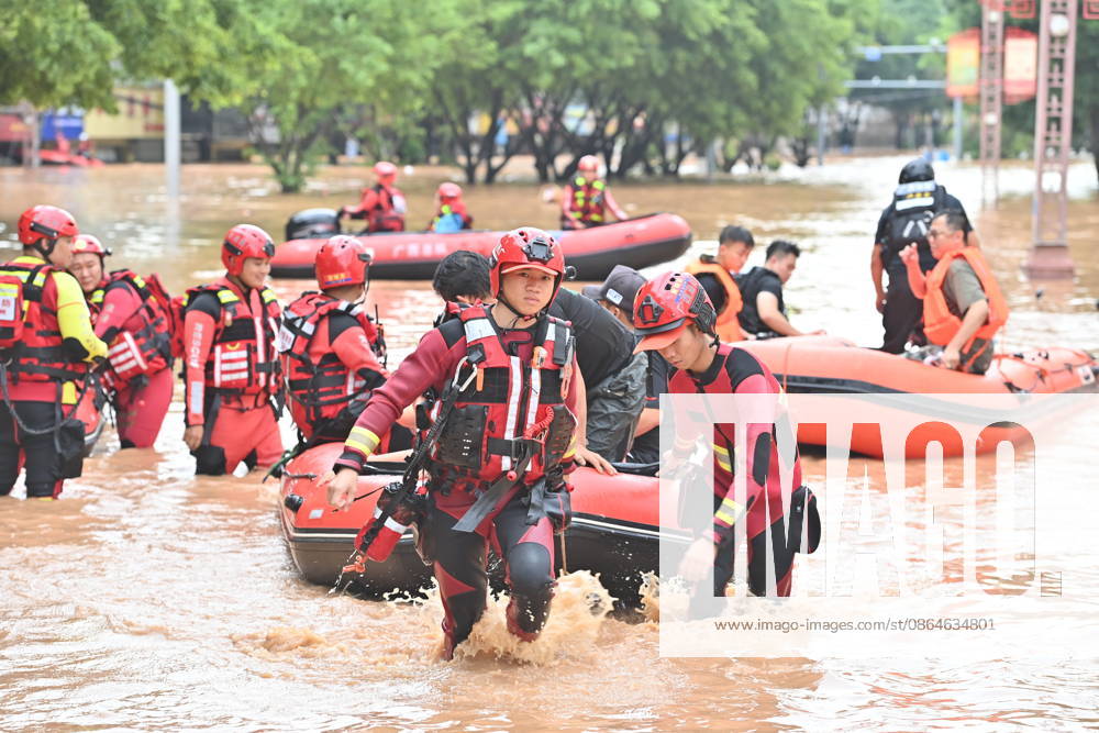 (260823) -- NINGMING, Aug. 23, 2026 -- Rescuers transfer stranded residents in Ningming County, south China s Guangxi Zhuang Autonomous Region, Aug. 23, 2026. For days, Ningming County has been battered by typhoon-triggered heavy rainfall. Response forces have pooled their efforts to urgently evacuate stranded residents. ) CHINA-GUANGXI-TYPHOON-STRANDED RESIDENTS-TRANSFER (CN) ZhouxHua