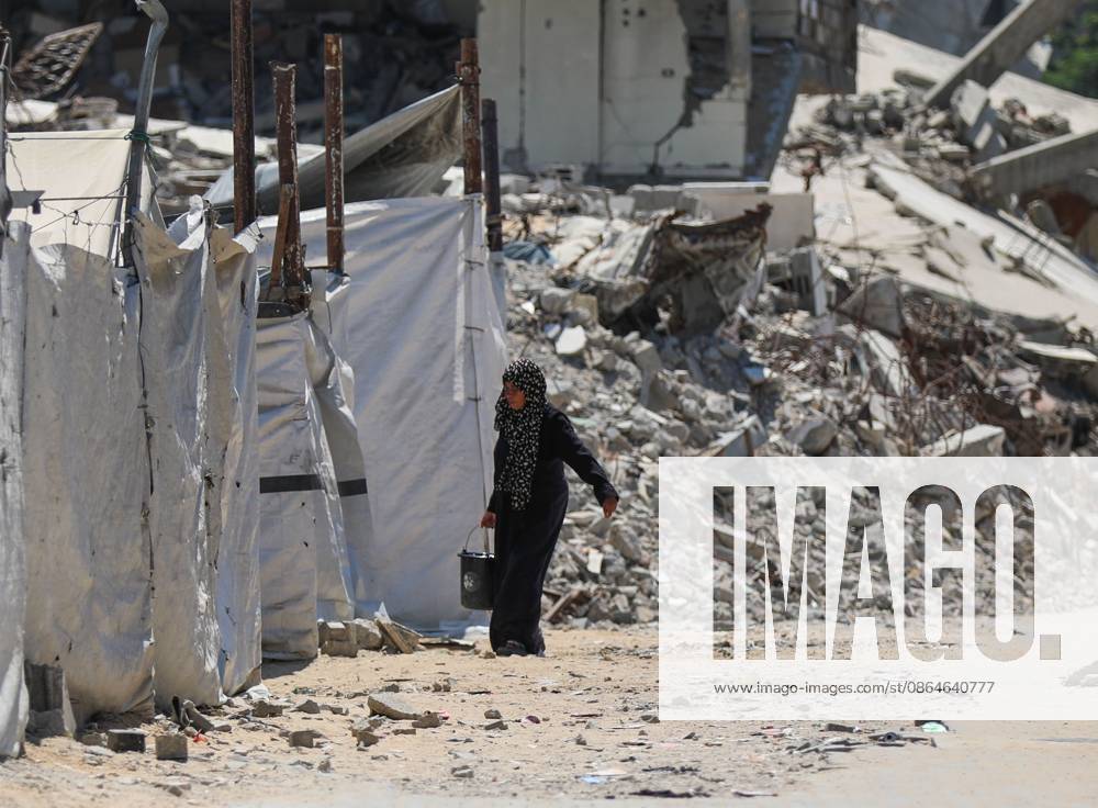 Palestinians live amid destruction in Jabalia camp JABALIA REFUGEE CAMP, NORTHERN GAZA STRIP, PALESTINE, AUGUST 23, 2026: Palestinians live amid the rubble of destroyed homes and extensive damage in Jabalia refugee camp in the northern Gaza Strip, facing difficult living conditions as they seek safety and basic necessities. JABALIA Palestine, State of