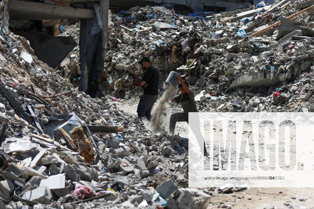 Palestinians live amid destruction in Jabalia camp JABALIA REFUGEE CAMP, NORTHERN GAZA STRIP, PALESTINE, AUGUST 23, 2026: Palestinians live amid the rubble of destroyed homes and extensive damage in Jabalia refugee camp in the northern Gaza Strip, facing difficult living conditions as they seek safety and basic necessities. JABALIA Palestine, State of