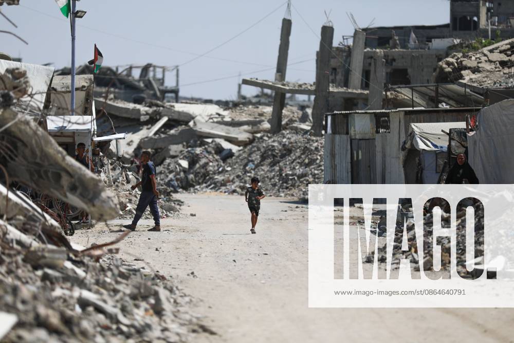 Palestinians live amid destruction in Jabalia camp JABALIA REFUGEE CAMP, NORTHERN GAZA STRIP, PALESTINE, AUGUST 23, 2026: Palestinians live amid the rubble of destroyed homes and extensive damage in Jabalia refugee camp in the northern Gaza Strip, facing difficult living conditions as they seek safety and basic necessities. JABALIA Palestine, State of