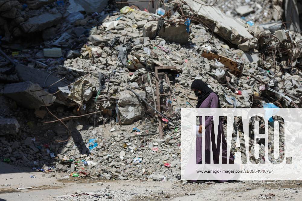 Palestinians live amid destruction in Jabalia camp JABALIA REFUGEE CAMP, NORTHERN GAZA STRIP, PALESTINE, AUGUST 23, 2026: Palestinians live amid the rubble of destroyed homes and extensive damage in Jabalia refugee camp in the northern Gaza Strip, facing difficult living conditions as they seek safety and basic necessities. JABALIA Palestine, State of