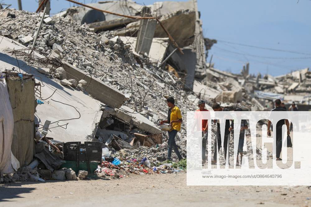 Palestinians live amid destruction in Jabalia camp JABALIA REFUGEE CAMP, NORTHERN GAZA STRIP, PALESTINE, AUGUST 23, 2026: Palestinians live amid the rubble of destroyed homes and extensive damage in Jabalia refugee camp in the northern Gaza Strip, facing difficult living conditions as they seek safety and basic necessities. JABALIA Palestine, State of