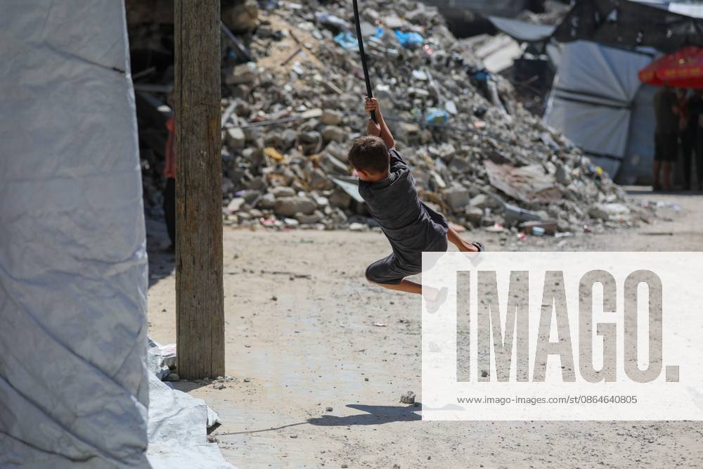 Palestinians live amid destruction in Jabalia camp JABALIA REFUGEE CAMP, NORTHERN GAZA STRIP, PALESTINE, AUGUST 23, 2026: Palestinians live amid the rubble of destroyed homes and extensive damage in Jabalia refugee camp in the northern Gaza Strip, facing difficult living conditions as they seek safety and basic necessities. JABALIA Palestine, State of
