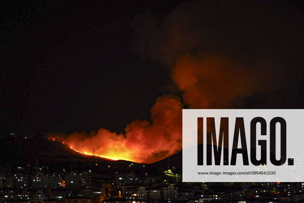 Firefighters respond to fire in wooded area in Ankara ANKARA, TURKIYE - AUGUST 23: Smoke rises from a wooded area in the Mamak district of Ankara, Turkiye on August 23, 2026, as firefighters work to extinguish the wide-scale fire using two fire trucks and three water tankers. Metin Aktas Anadolu Ankara Turkey. Editorial use only. Please get in touch for any other usage.